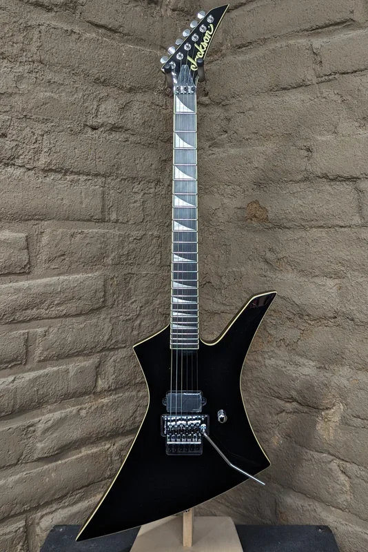 Jackson Pro Plus Series KE1A Kelly Limited-edition Electric Guitar – Gloss Black, Aged White Binding (New)